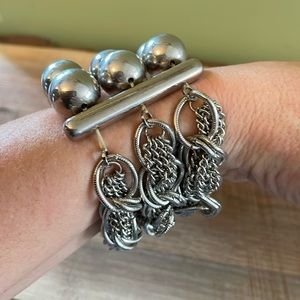 Silver stack bracelet “balls and chains”.